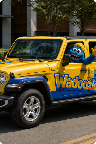 Inside the Wadoozie bus lounge with the mascot.